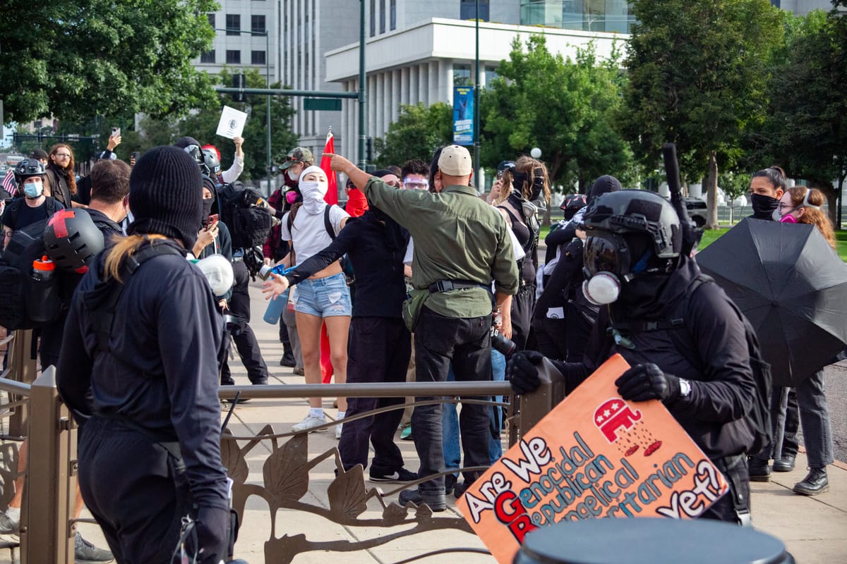 Journalist ‘Attacked’ at Colorado State Capitol by Protesters. Witnesses Tell a Different Story.